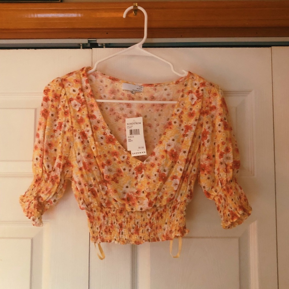 Floral cropped ruffle shirt